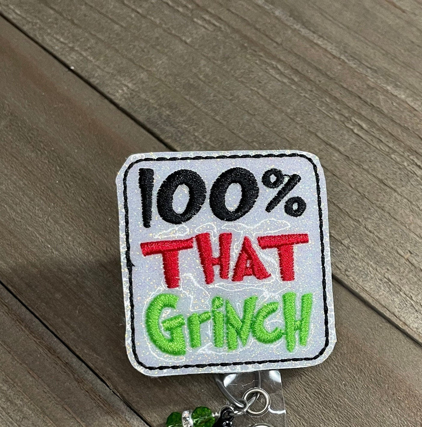 100% that Grinch Retractable Badge